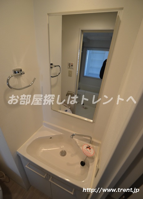 Washroom. It is a photograph of the same building 1K. Please see for reference.