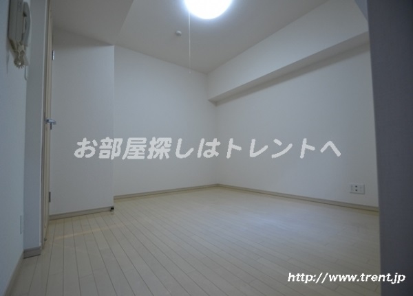 Living and room. Is a reference photograph of the same building 1K.