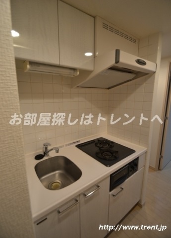 Kitchen. Is a reference photograph of the same building 1K.