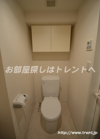 Toilet. Is a reference photograph of the same building 1K.