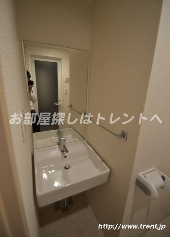 Washroom. Is a reference photograph of the same building 1K.