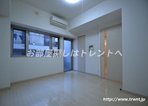 Living and room. Is a reference photograph of the same building 1K.