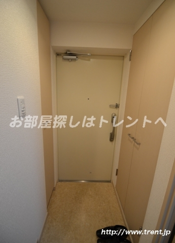 Entrance. Is a reference photograph of the same building 1K.