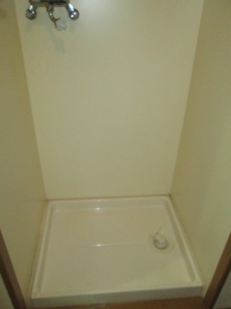 Other Equipment. Washing machine in the room