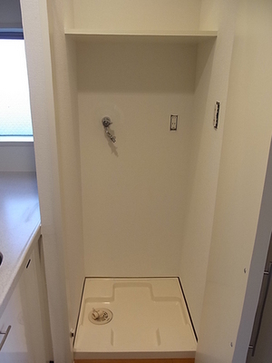 Other Equipment. Washing machine in the room