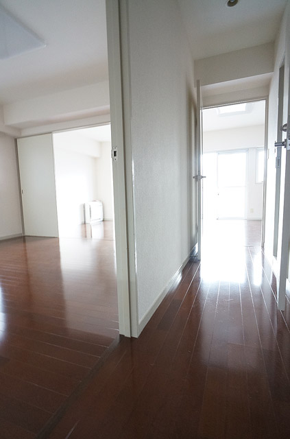 Other. Photo seen the living than the room corridor