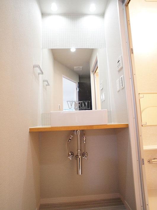 Wash basin, toilet. Vanity, such as hotels
