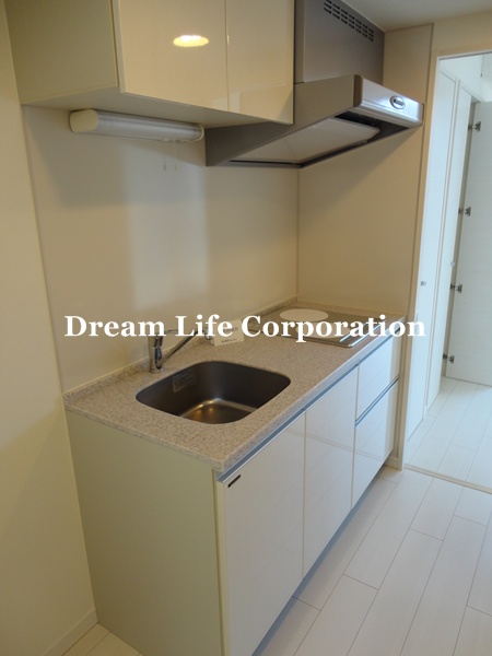 Kitchen.  ※ In fact the we use the photos in the same building may be different.