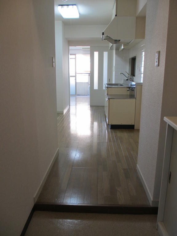 Other room space. View from the entrance to the balcony