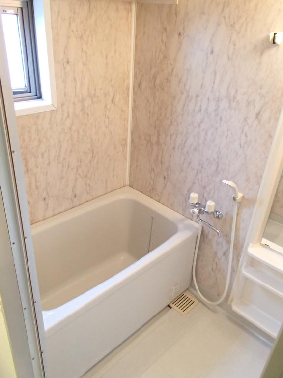 Bath. It comes with a window in the bathroom. (Moisture is not worried)