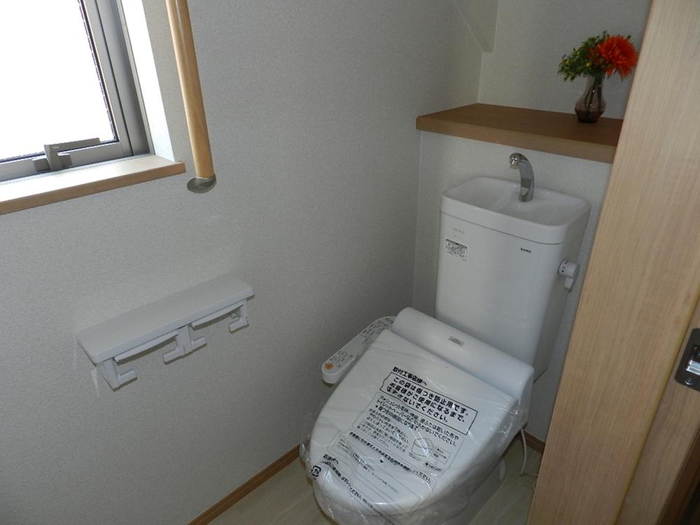 Toilet. With toilet shower