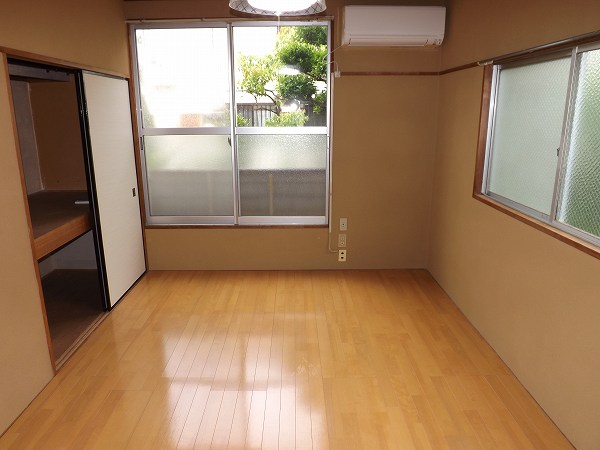 Living and room. Flooring is also shiny.