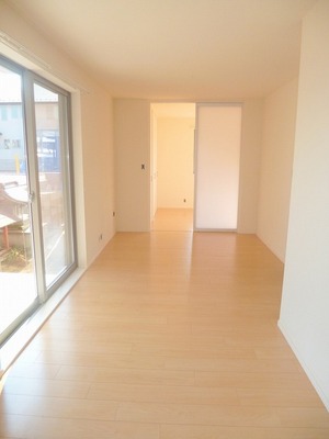 Living and room. Open living (flooring is dark brown)