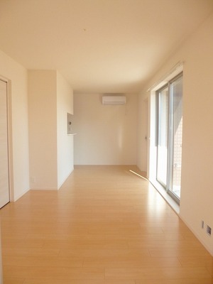 Living and room. Open living (flooring is dark brown)