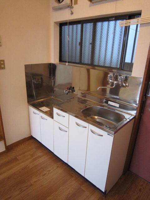 Kitchen. It comes with a window in the kitchen.