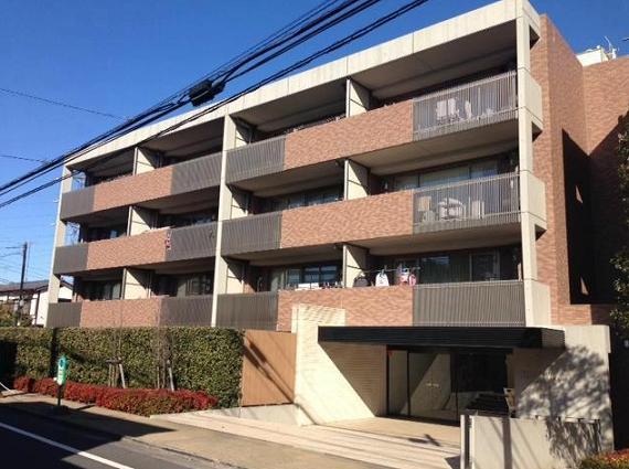 Local appearance photo. Low-rise apartment nestled in a quiet residential area