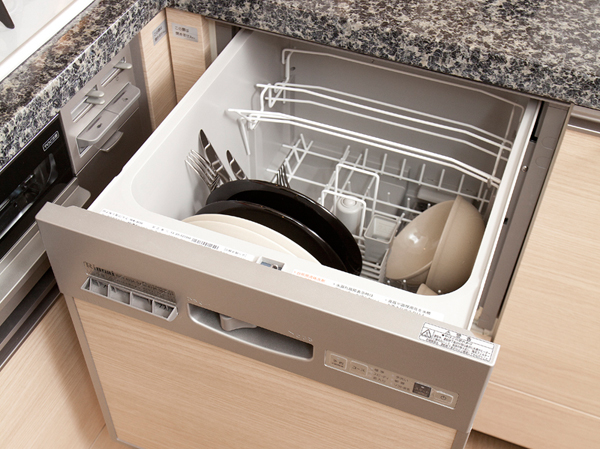 Kitchen.  [Dishwasher] Lightly support the cleaning up of the meal. Will lead to running cost mitigation for also requires less water usage compared to hand washing.
