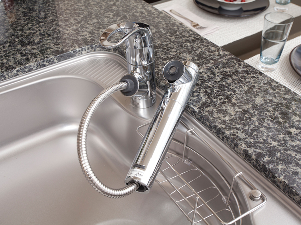 Kitchen.  [Water purifier integrated shower faucet] Luxury features packed into a simple styling. Water purification ・ It can be easily in the switching lever operation of the raw water and shower, It can be pulled out a water purifier for each head.