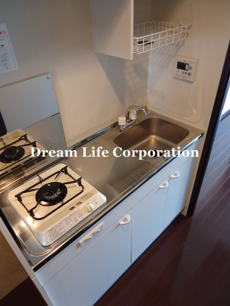 Kitchen.  ※ In fact the we use the photos in the same building may be different.