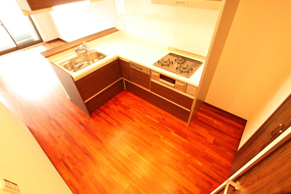 Kitchen. Gas stove with a grill is a three-necked.