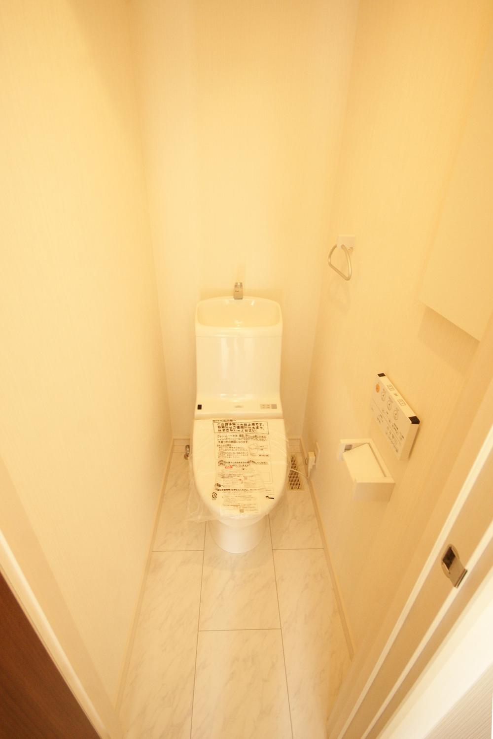 Toilet. Washlet is with