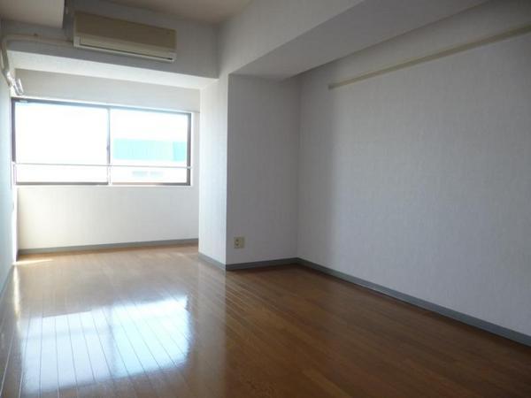 Living and room. It is a surprisingly wide! 