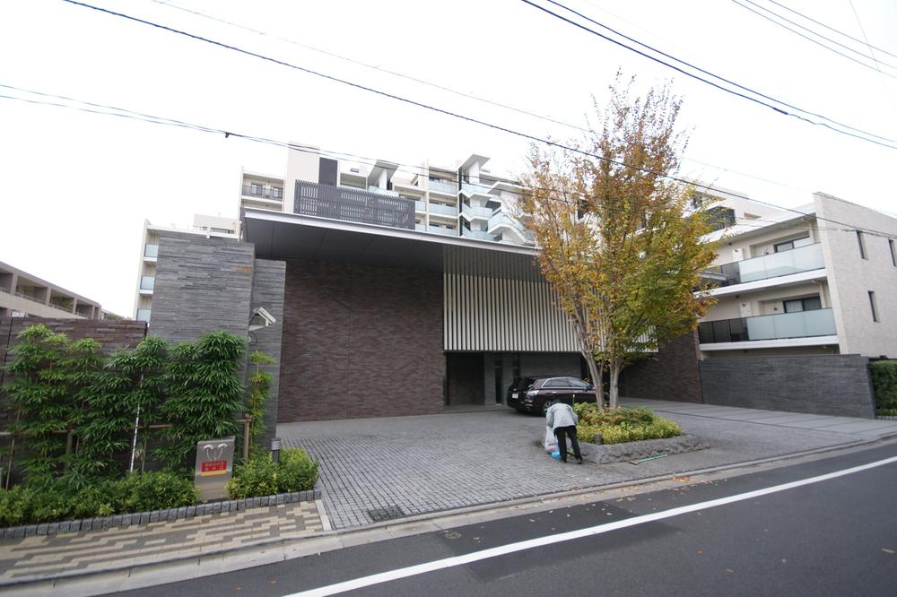 Local appearance photo. The surrounding environment is a leafy quiet residential area.