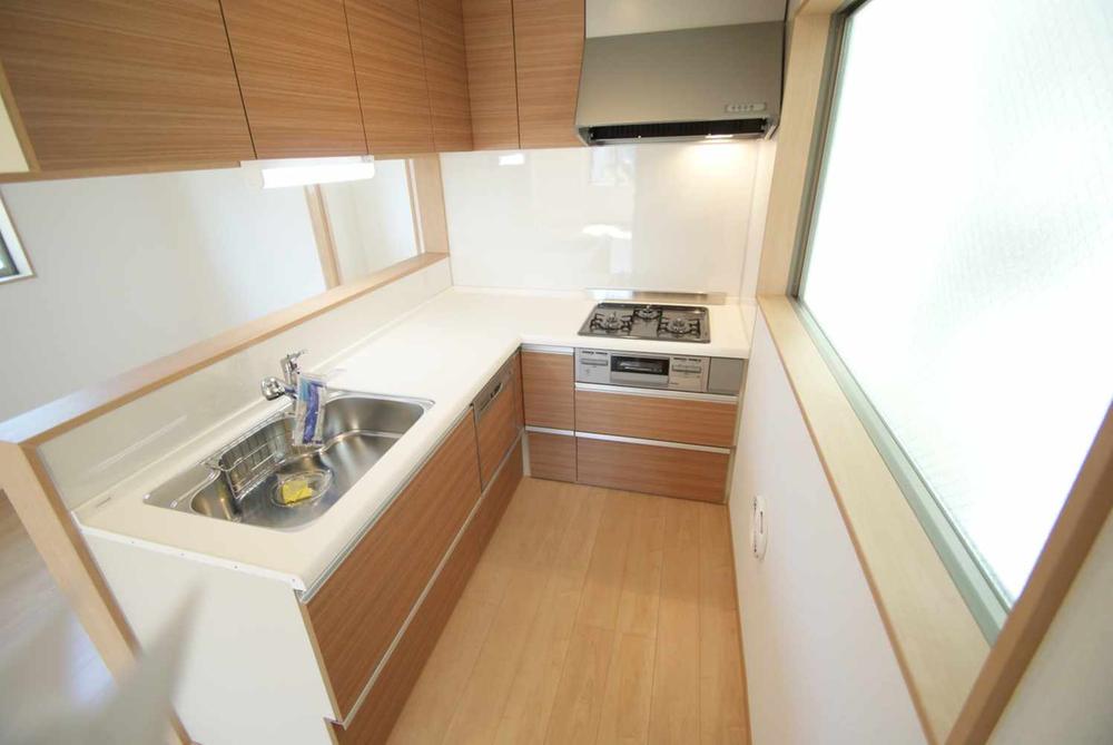 Kitchen. The back of the window has to brighten the dark tend to kitchen. I can be in a bright mood this if even daily household chores