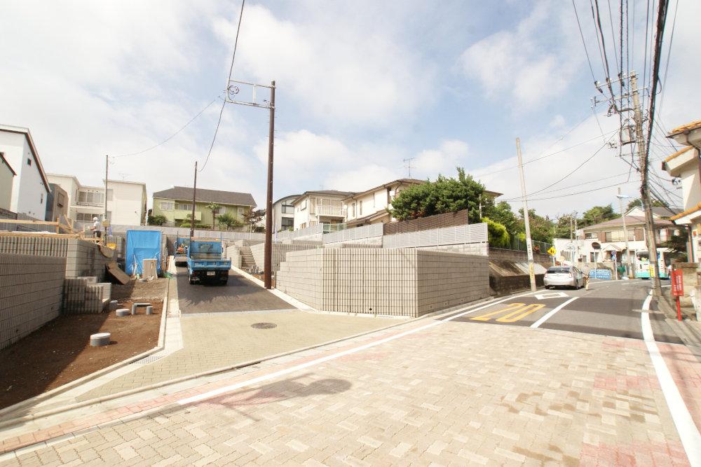 Local photos, including front road. Front road of laying interlocking