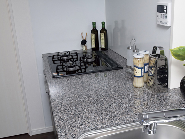 Kitchen.  [Natural stone counter] Kitchen counter top, Using some of the dignity natural stone. Beauty of the pattern scattered at the point is attractive.