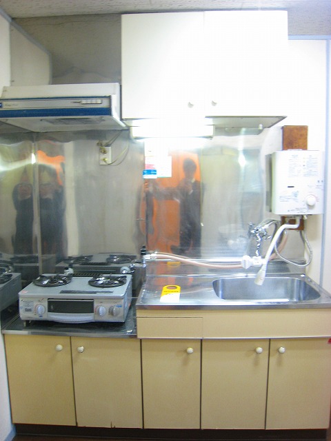 Kitchen. Two-burner gas stove is removed already