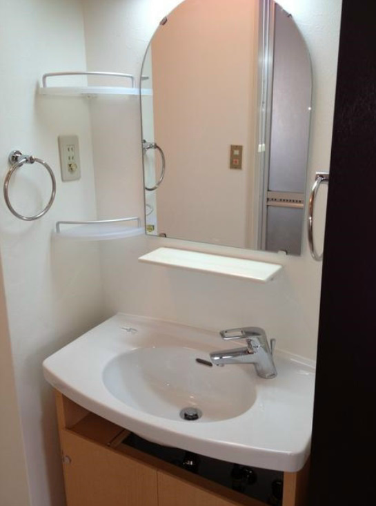 Other. Independent wash basin with a large mirror