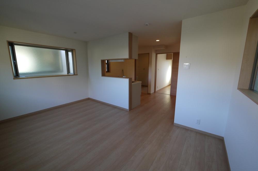 Living. Window reflected in the photograph back has become a bay window, It might be a good even decorate a little flower. 