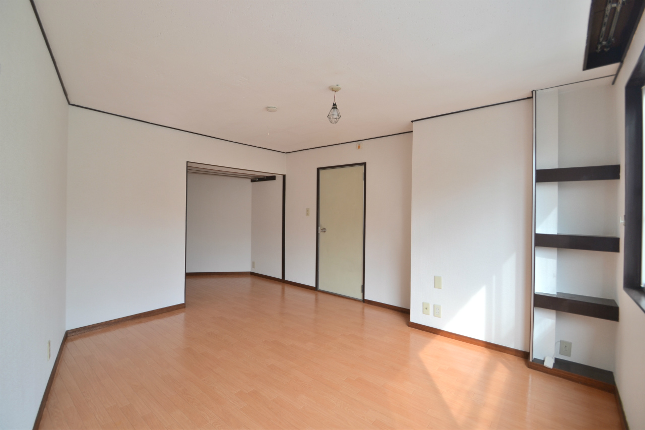 Living and room. Is the cabinet look on the right-hand side.