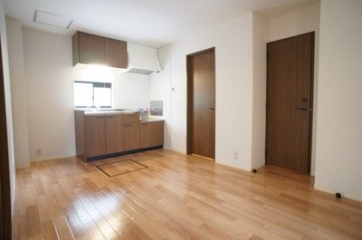 Living and room. I see the kitchen from the east room!