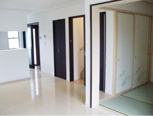 Non-living room. Japanese-style room leading from the living room