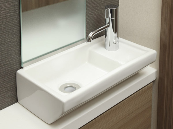 Bathing-wash room.  [Toilet in the restroom counter] Set up a counter for hand washing in the toilet. To produce a feeling of luxury.