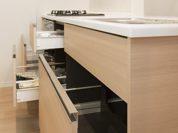 Kitchen.  [Bull motion function with slide storage] To absorb the shock, Quietly closed Bull motion function with slide storage. (Model Room WD type)