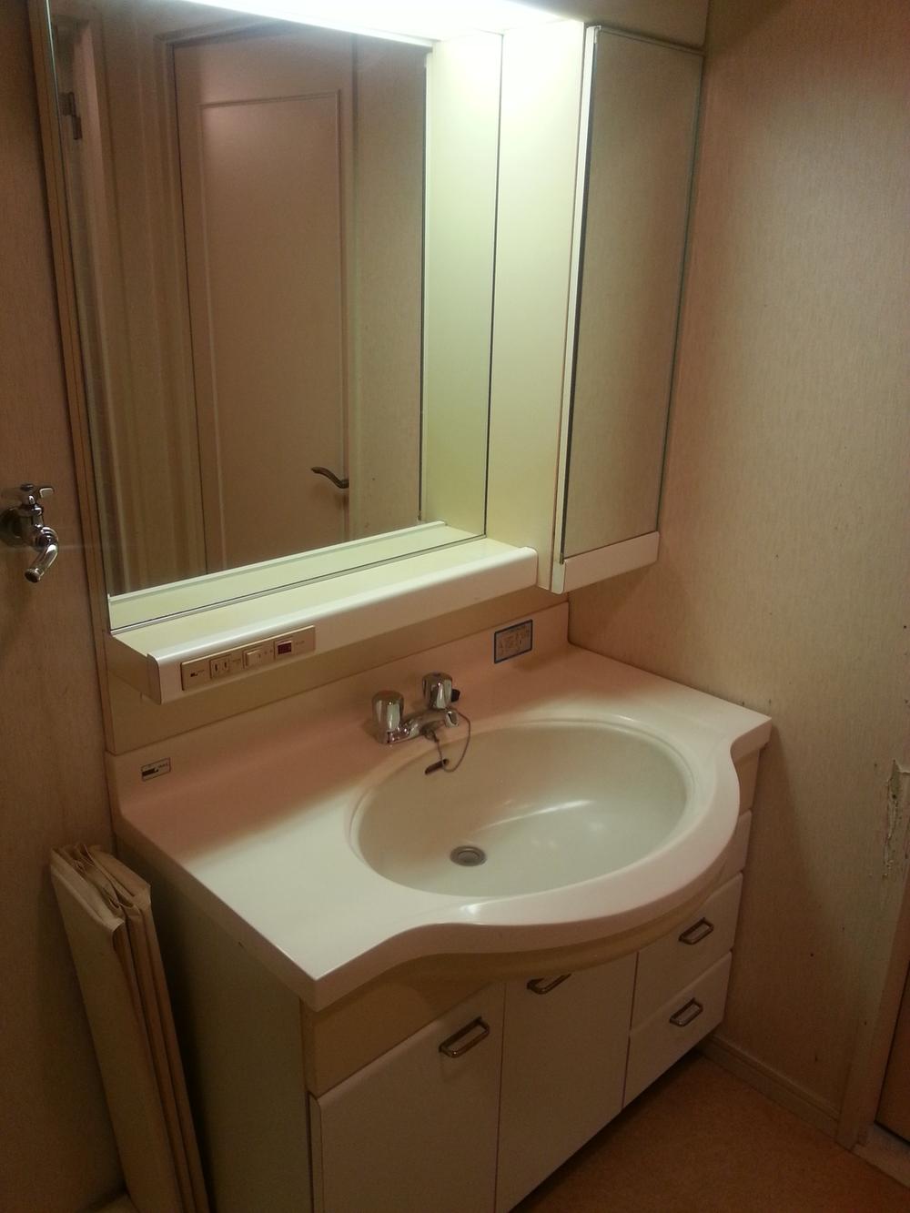 Wash basin, toilet. Bathroom vanity