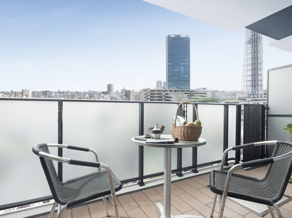 Other. A balcony that extends outside of the large windows depth of about 2.0m (different by the plan)