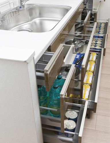 Kitchen.  [Sliding storage] Storage of system kitchens, It can be effectively utilized in the prone cabinet in a dead space, It has adopted a sliding storage.