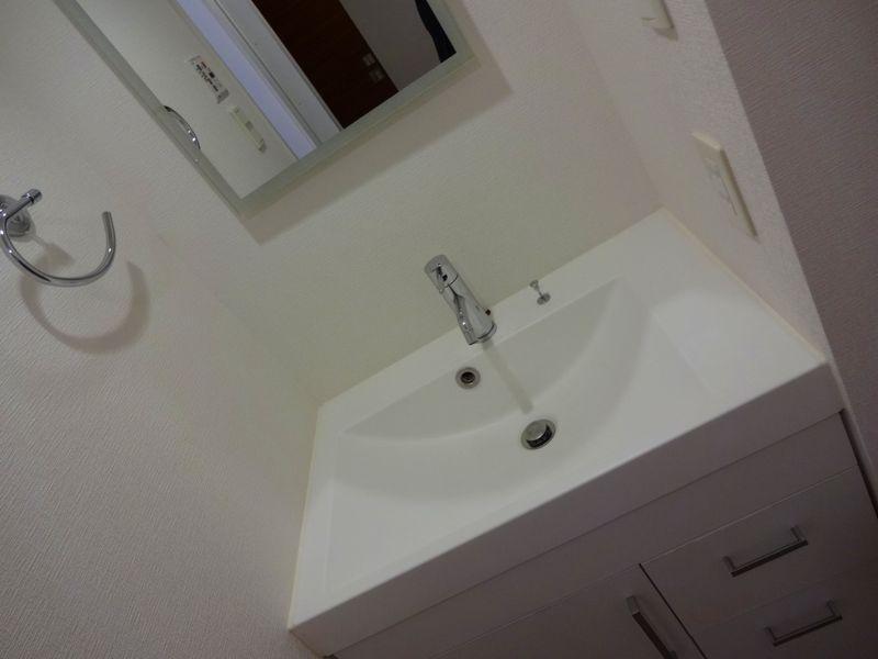 Wash basin, toilet. Bathroom vanity