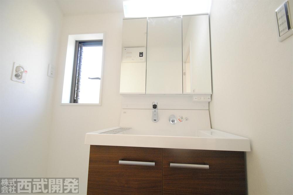 Wash basin, toilet. A Building