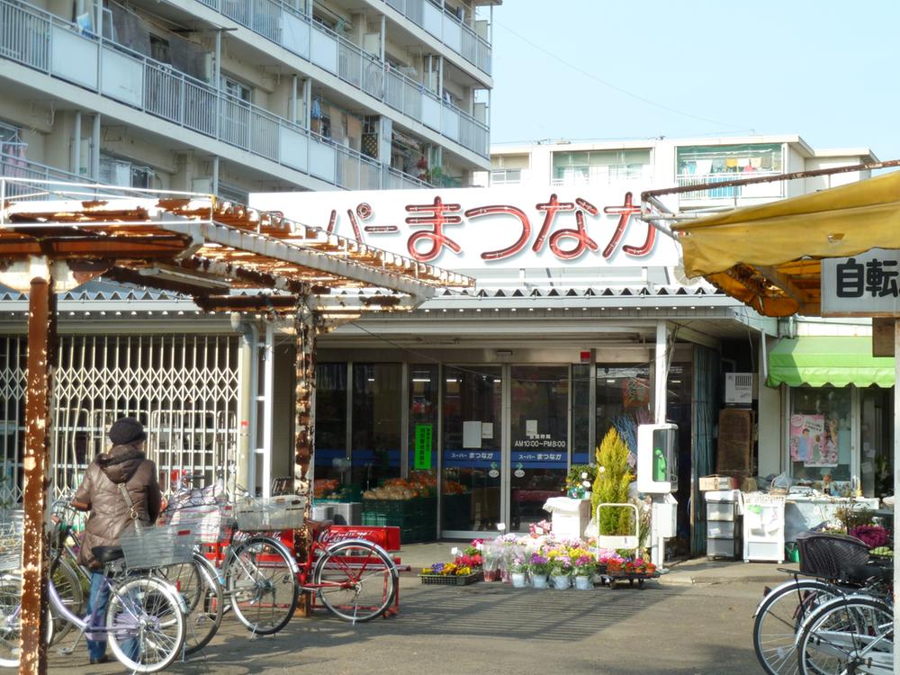 Supermarket. 1000m up amid pine super