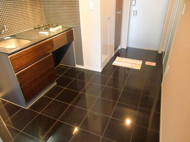 Living and room. Kitchen part is the stylish tiled.