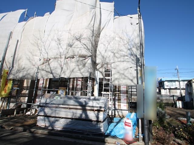 Local appearance photo. B Building Under construction