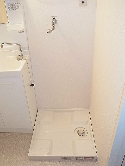 Other Equipment. Washing machine in the room