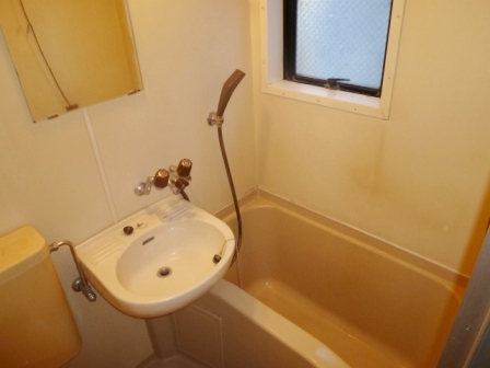 Bath. There is a window in the bathroom