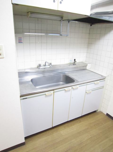 Kitchen. The kitchen is Innovation location type the gas stove on your own.