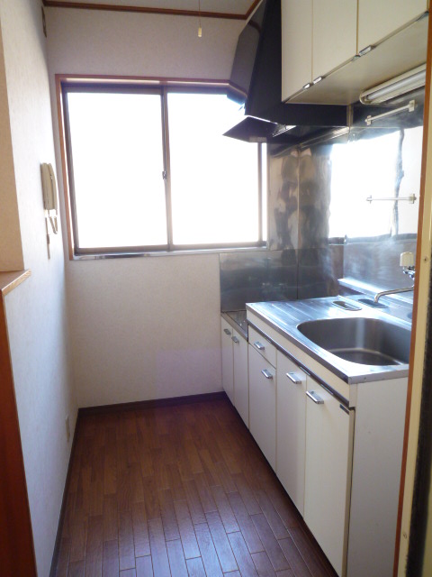 Kitchen. There is bright there windows in the kitchen.